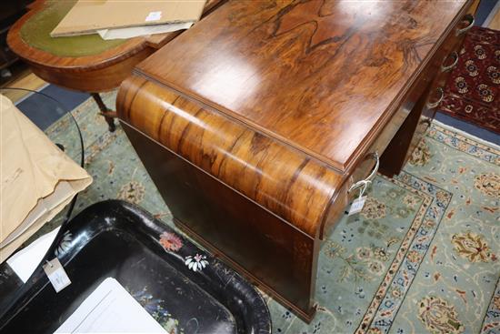 An Art Deco figured walnut desk W.109cm